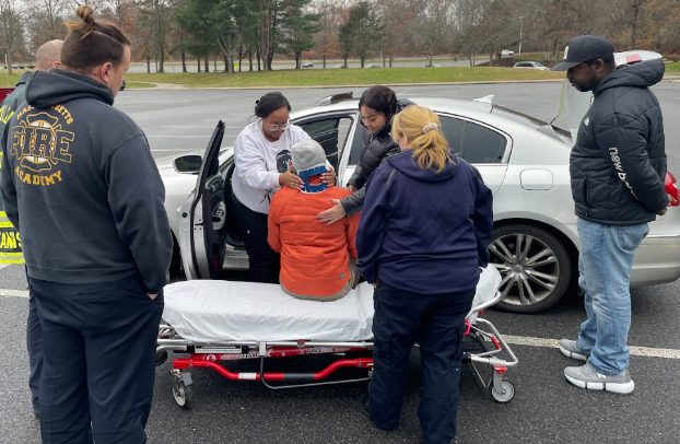 EMT students working on their psychomotor skills.