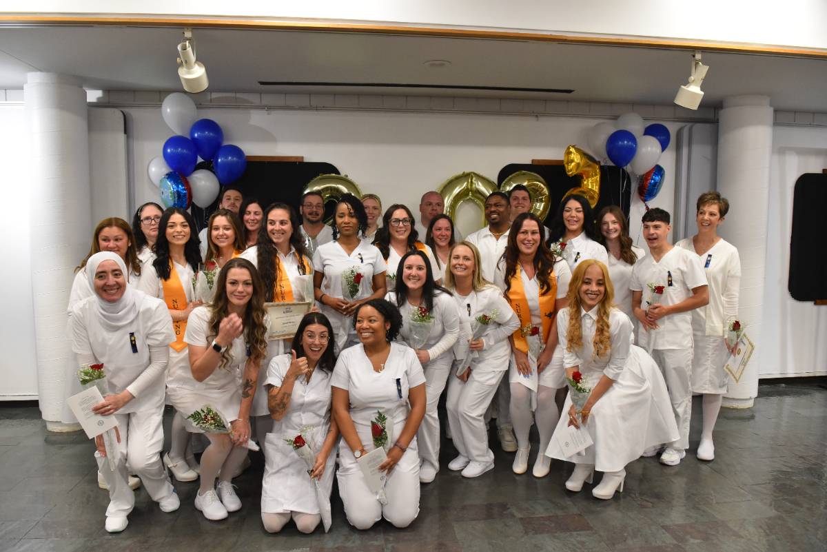 Nursing students group photo at pinning ceremony.